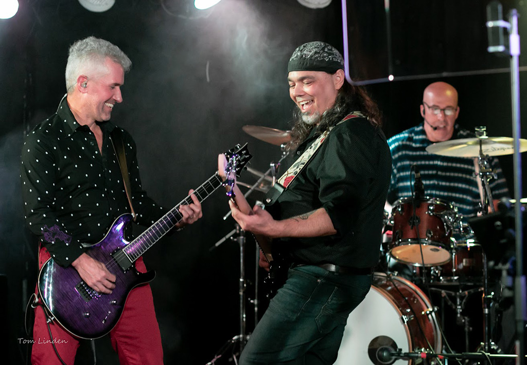 Chris, Ron and Tim on stage